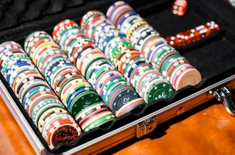 Casino chips in a suitcase Stock Photos
