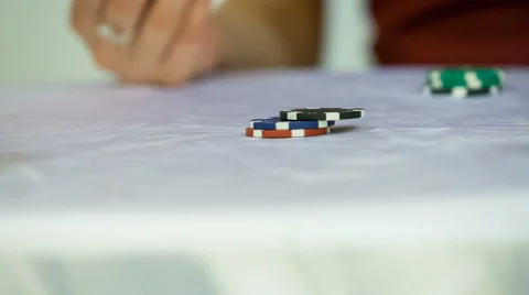 Casino chips on white table Stock Footage 66362401