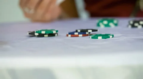 Casino chips on white table Stock Footage 66362790