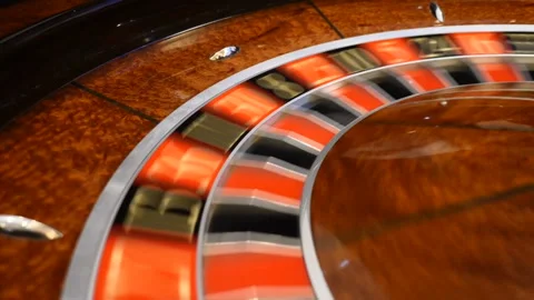 Casino concept. Top view on roulette in motion, white ball spinning and stopping Stock Footage 101204237