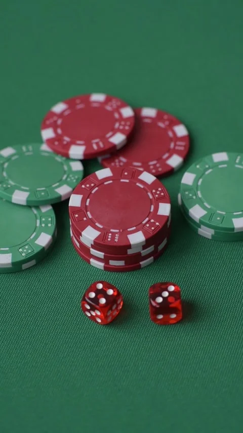 Casino dice and chips on a colored background, poker, gambling with bets. Dice a Stock Footage 328872716