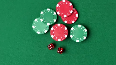 Casino dice and chips on a colored background, poker, gambling with bets. Dice a Stock Footage 328872956