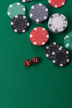 Casino dice and chips on a colored background, poker, gambling with bets. D.. 스톡 사진