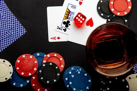 Casino with dice on cards with whiskey Stock Photos