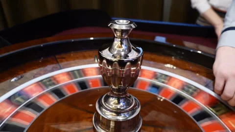 Casino theme. Top view on roulette in motion, white ball spinning. Bad luck and Stock Footage 101203956