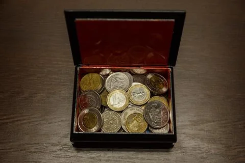 Casket with coins. Stock Photos
