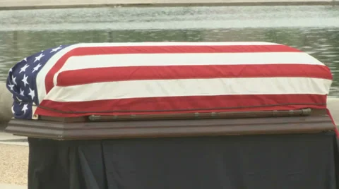 Casket covered with American Flag Stock Footage 38220396