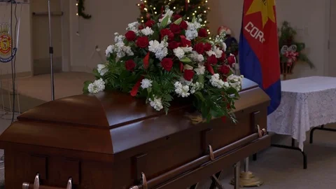 Casket with flowers on the top (group of 3). 库存影片 77282017