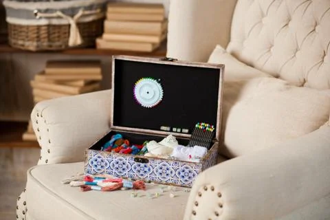 Casket for needlework, sewing in style interior Stock Photos