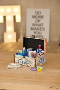 Casket for needlework, sewing in style interior Stock Photos