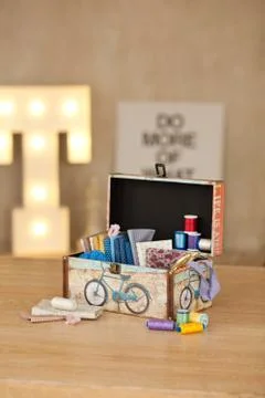 Casket for needlework, sewing in style interior Stock Photos
