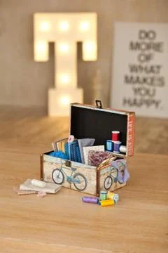 Casket for needlework, sewing in style interior Stock Photos