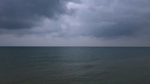 The Caspian Sea under a dramatic, cloudy sky Stock Footage 336247051