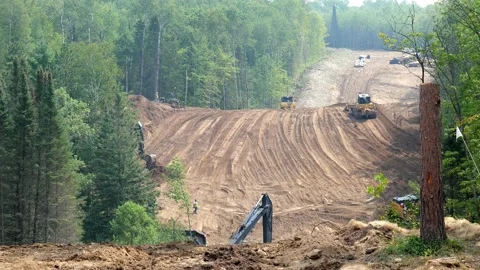 CASS CO, MN - 6 AUG 2021: Machines at Line 3 Oil Pipeline Construction Site Stock Footage 159731929