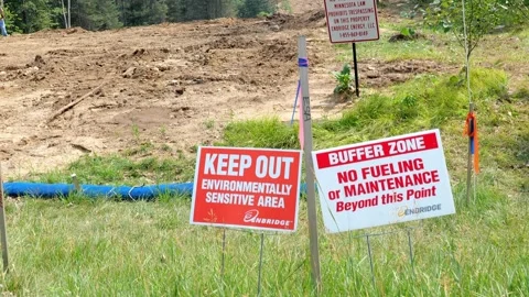 CASS CO, MN - 6 AUG 2021: Warning Sign at Line 3 Pipeline Construction Site Stock Footage 160122476