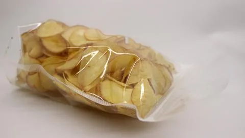 Cassava chips packaged using plastic. Stock Photos