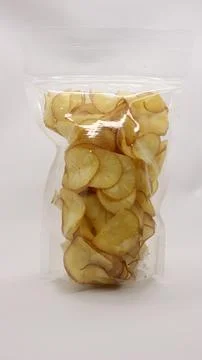 Cassava chips packaged using plastic. Stock Photos