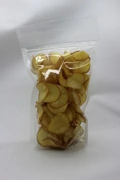 Cassava chips packaged using plastic. Stock Photos