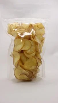 Cassava chips packaged using plastic. Stock Photos