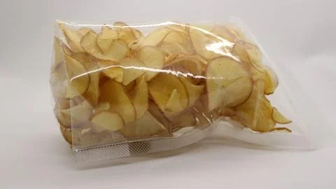 Cassava chips packaged using plastic. Stock Photos