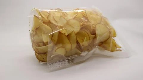 Cassava chips packaged using plastic. Stock Photos