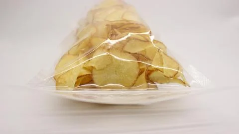 Cassava chips packaged using plastic. Stock Photos