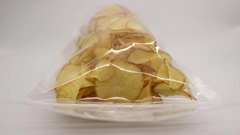 Cassava chips packaged using plastic. Stock Photos