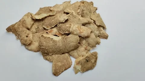 Cassava peel on a white background Stock Footage 313418470