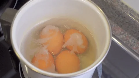 Casserole with boiling eggs 스톡 동영상 101371517