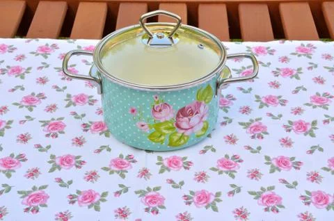 Casserole with floral pattern Stock Photos