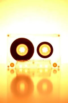 Cassette backlit by orange light Stock Photos