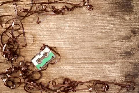Cassette with pulled out tape. Stock Photos