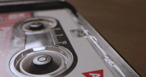 Cassette Recorder Sitting On Table Playing Audio. Recording Audio Or Playing Stock Footage 165966999