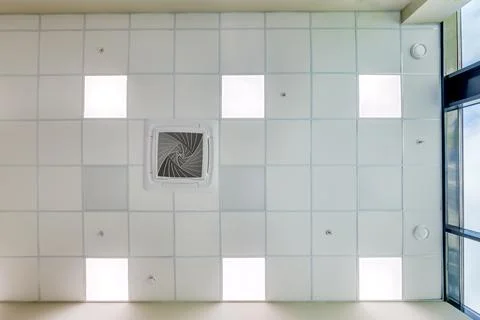 Cassette stretched or suspended ceiling with square halogen spots lamps and d Stock Photos