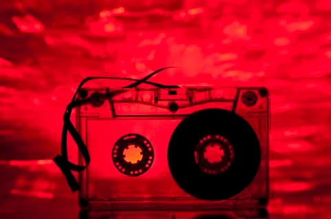 Cassette tape and multicolored lights Stock Illustration
