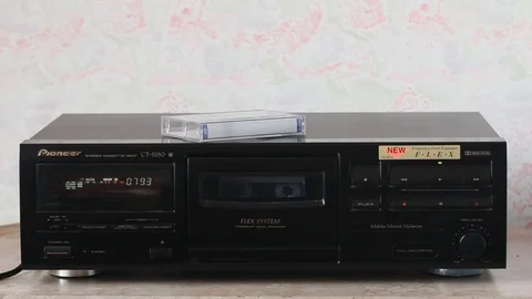 Cassette on the tape recorder Stock Footage 88989016