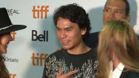 Cast and crew member posing for movie 'Blood Quantum' during 2019 TIFF premiere 스톡 동영상 117636618