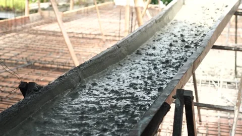 Cast concrete flows in the gutter plate Stock Footage 273075044