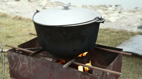 The cast-iron pot is on fire Видео 61574946