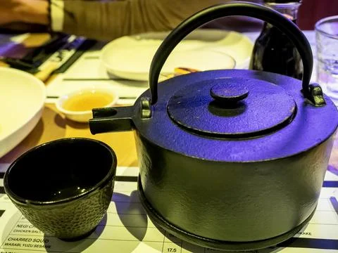Cast Iron Teapot on a dining table for brewing tea Stock-Fotos
