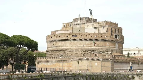 Castel SantAngelo  with a plane flying over it in Rome Italy, slowmo HD Stock Footage 81823117