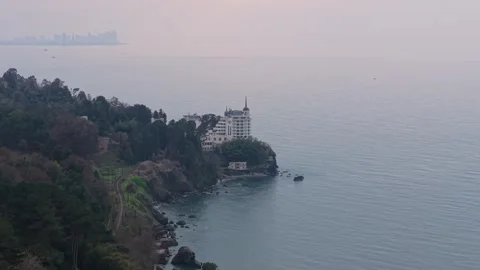Castello Mare Winter Reveal: Misty Black Sea Landscape and Cliffside Hotel Stock Footage 336740887