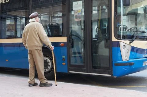 CASTELLON, SPAIN - 2016: an older man waits for the bus Stock Photos