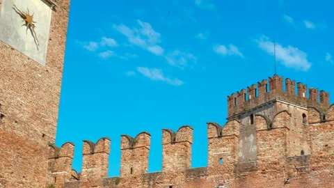 Castelvecchio clock tower and medieval walls zooming out in verona, italy Stock Footage 320052760