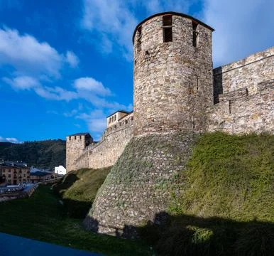 The Castillo de los Templarios, a Historic stone castle wall with towers Stock Photos