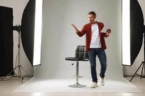 Casting call. Man with script performing in studio Stock Photos
