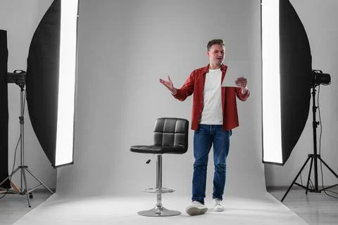 Casting call. Man with script performing in studio 写真素材