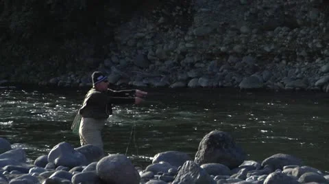 Casting a fly into a river Stock Footage 11411881