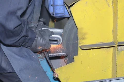 Casting Iron grinding process by grinding wheel ; finishing process before ma Stock Photos