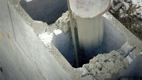 Casting pump concrete to foundations of house. Workers work on site. Stock Footage 88810955